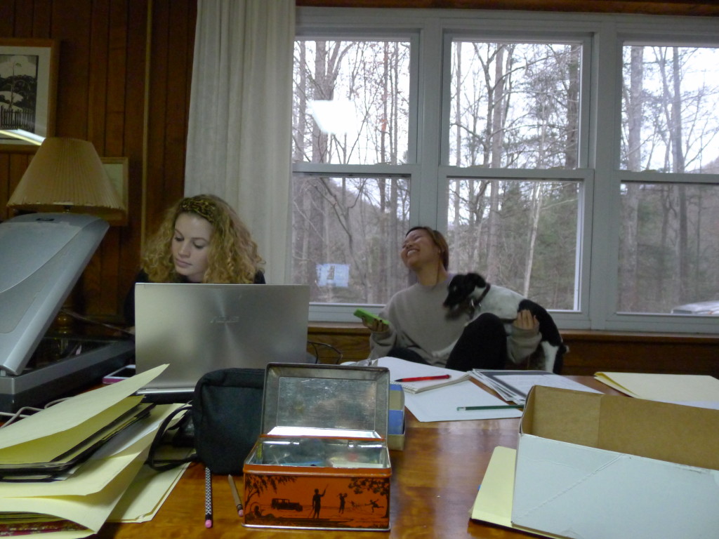 James Madison crew working on the archive with a little help from a friend.